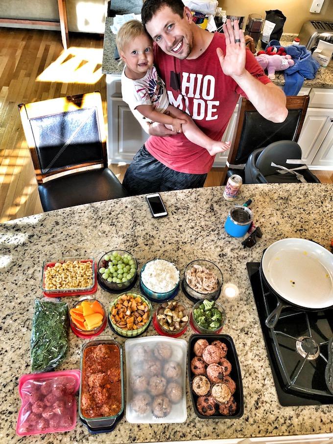 dad and toddler with food prep