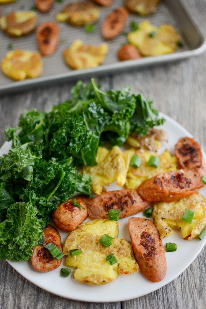 Sheet Pan Sausage and Smashed Potatoes with parmesan