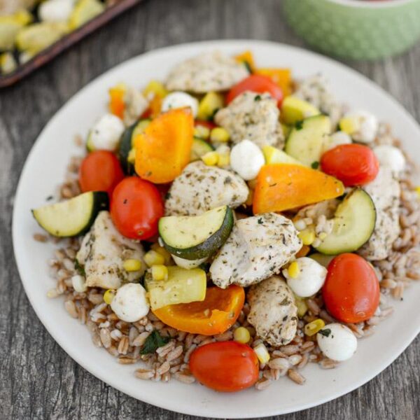 Sheet Pan Caprese Chicken with herbs, zucchini and peppers