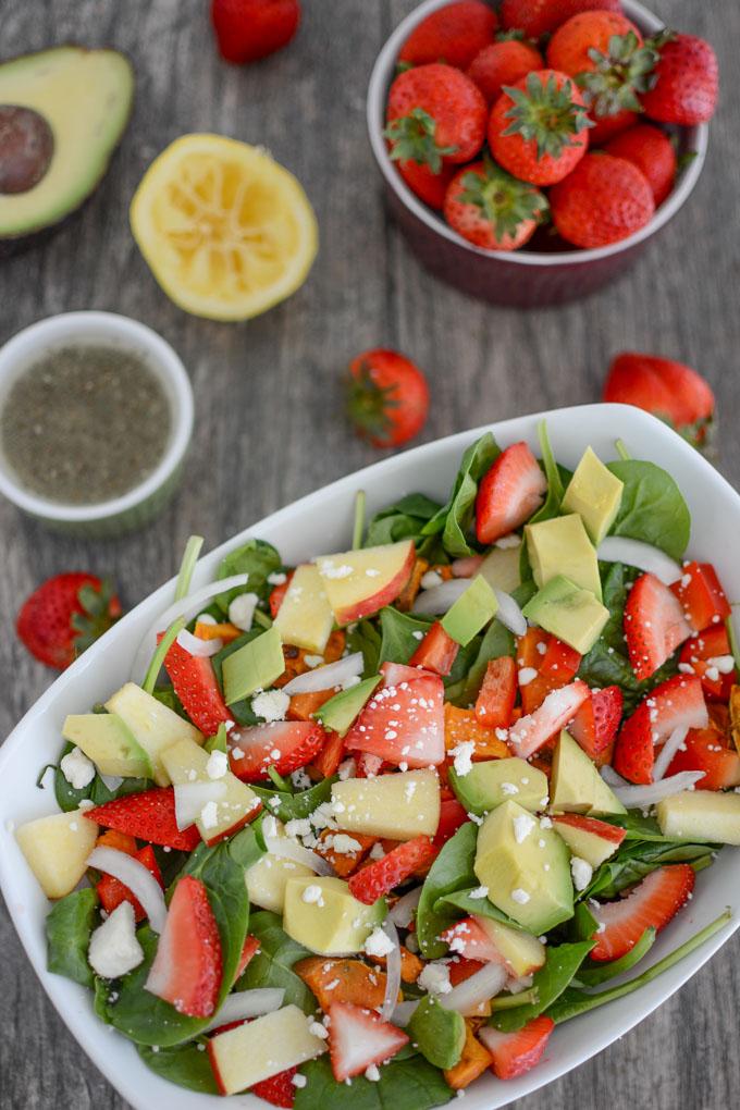 Loaded strawberry spinach salad with lemon poppyseed dressing