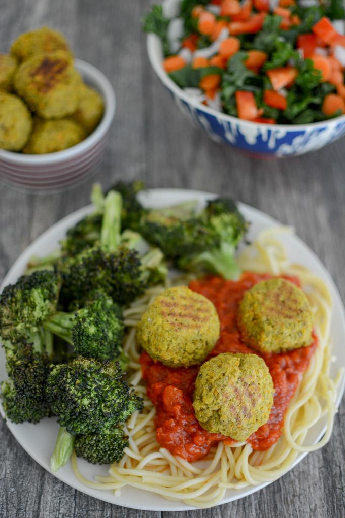 Pesto Lentil Balls over spaghetti with broccoli