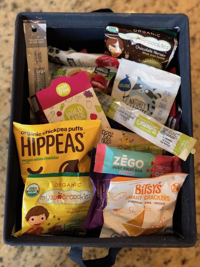 bin of healthy packaged snack foods for school lunch packing