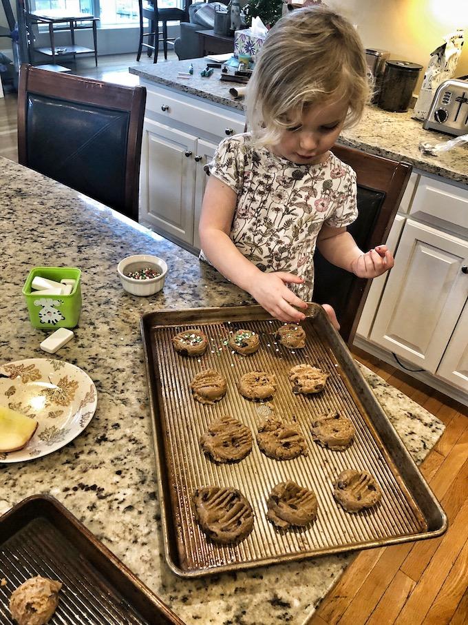 preschooler baking cookies