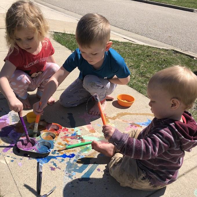 kids with sidewalk chalk paint