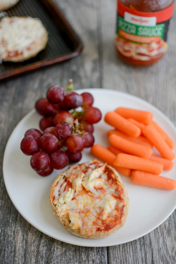 Frozen english muffin mini pizzas with grapes and carrots
