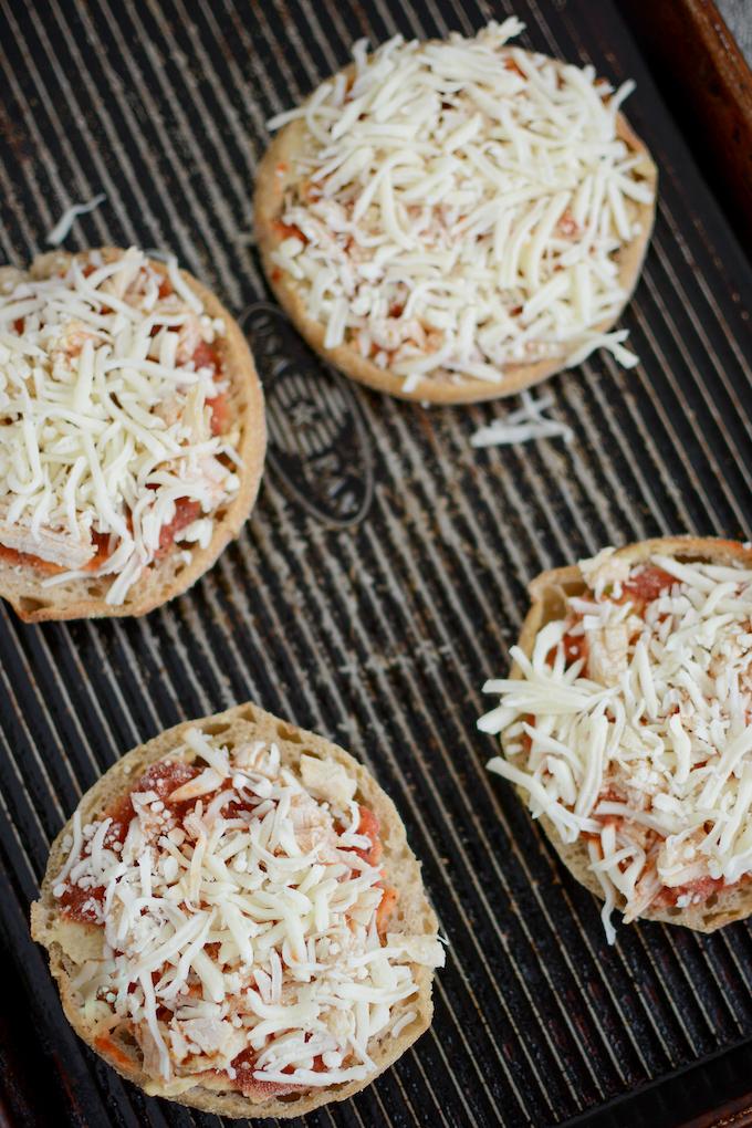 frozen english muffin pizzas on a tray