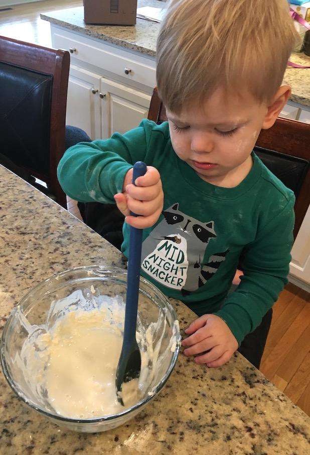 toddler stirring 