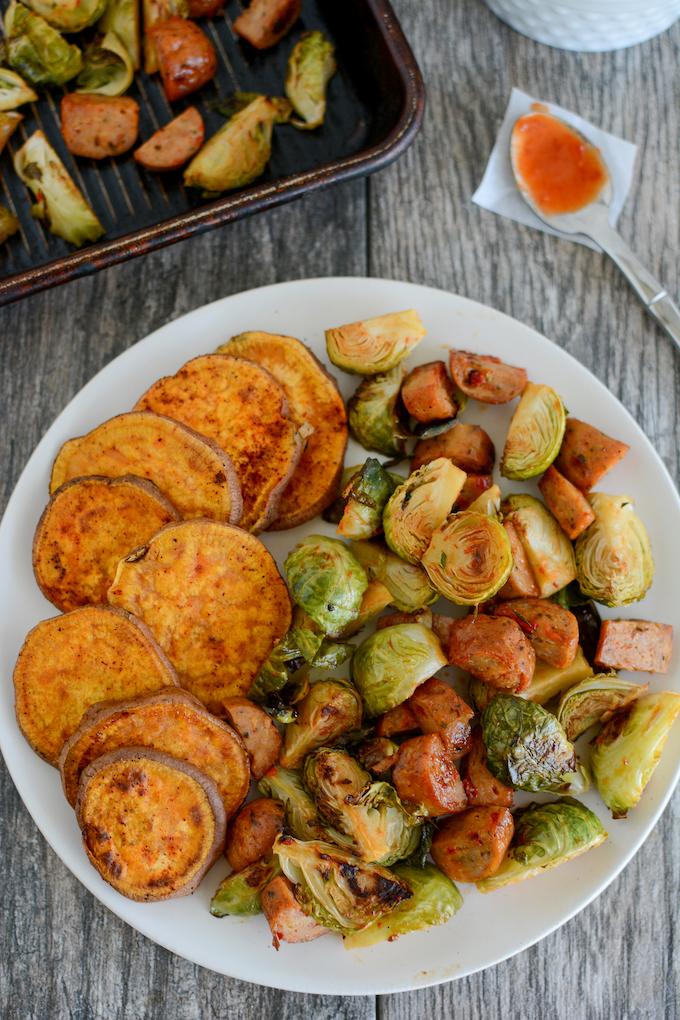 Sweet and Spicy Oven Roasted Brussels Sprouts with chicken sausage and sweet potatoes