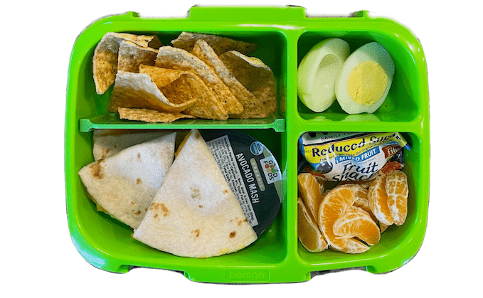 easy kids lunch - quesadilla, chips and guacamole, hard boiled egg, clementine and fruit snacks