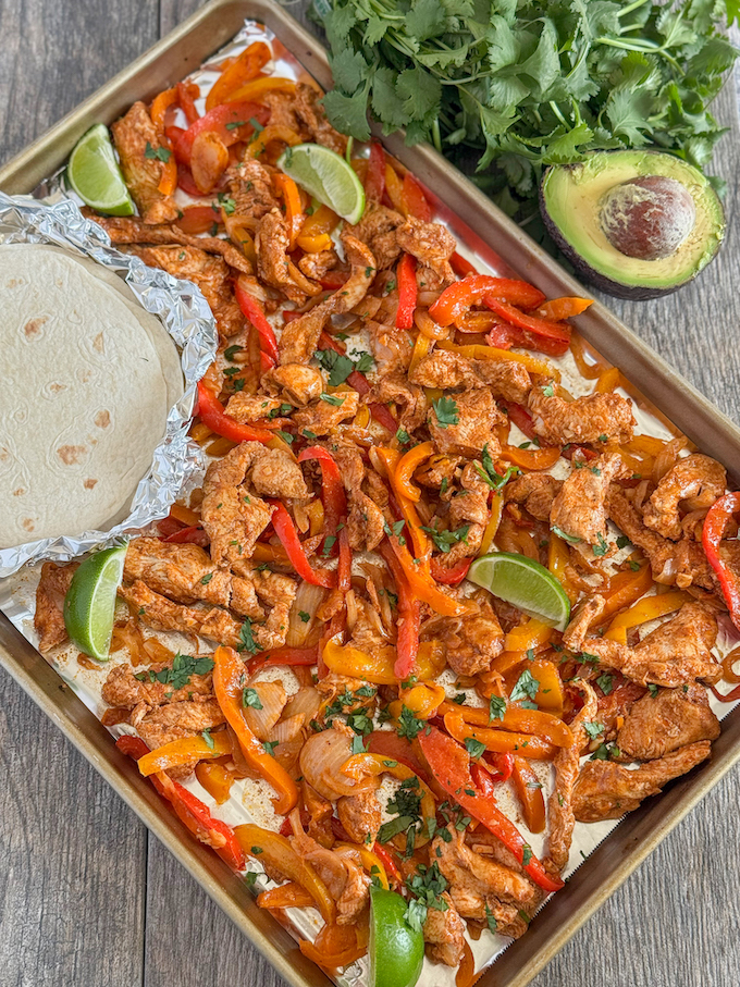 sheet pan chicken fajitas with cilantro, lime and avocado