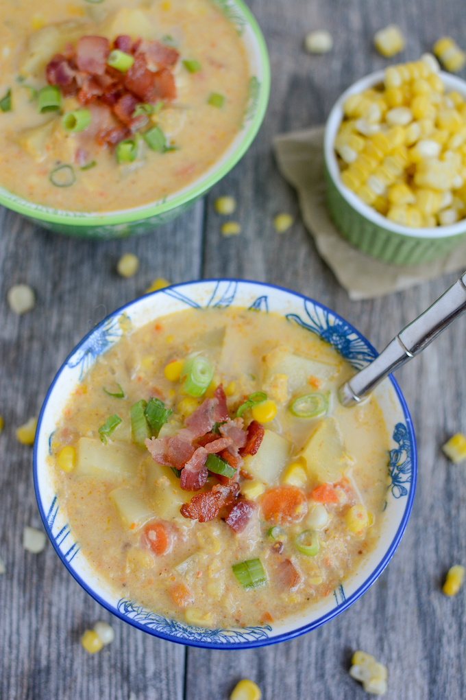 healthy corn chowder topped with bacon and green onions